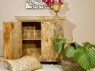 image with open door of a boho style mango wood furniture cabinet with hand-carved floral doors, Mediterranean-inspired design, 90 × 90 × 40 cm.