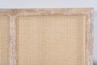 Image of the head board of a handcrafted Indian bed Tapti in solid mango wood with rattan panels, artisanal bedroom furniture, 180 × 200 cm.